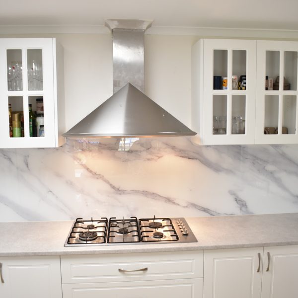 White and grey marble look glass splashback