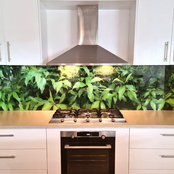 close up view of printed glass splashback leaves image